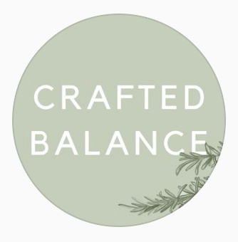 pale green logo with white font that says: crafted balance